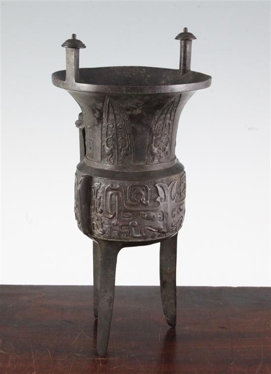 A Chinese bronze tripod wine vessel, Jia, Song dynasty, 31.5cm